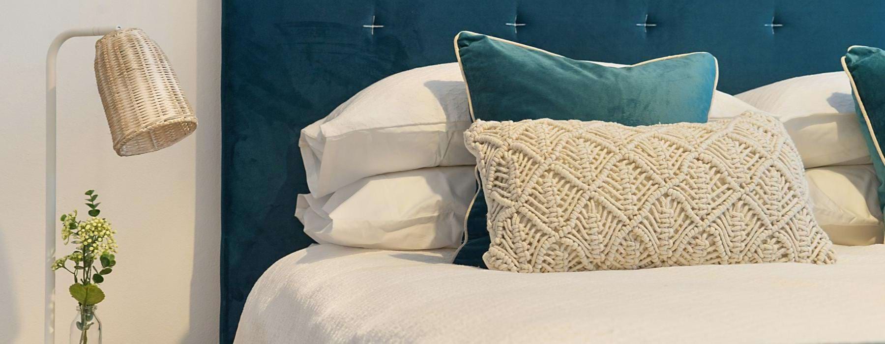 a bed with pillows