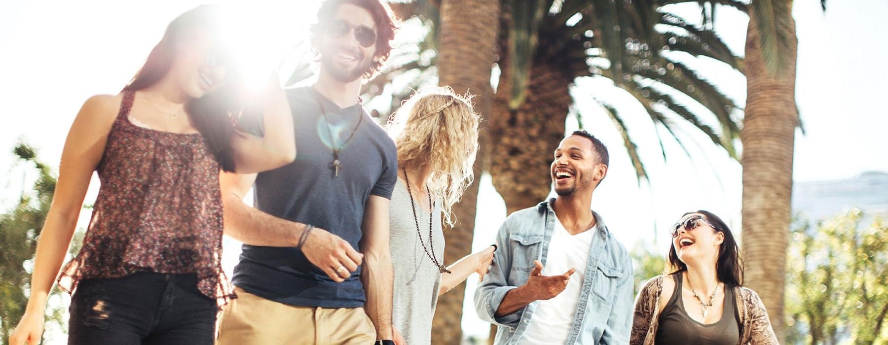 a group of people walking outside