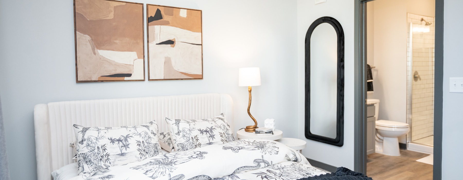 bedroom with bathroom door attached