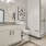 well lit bathroom with walk-in shower