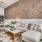 spacious living room with brick wall